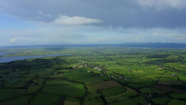 Lough Derg, County Tipperary, Ireland, September 2021. Drone gradually pulls backwards across Nenagh parallel with Carrowgar Bay while looking northeast towards Youghal Bay and Dromineer.