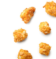 Tasty crunchy popcorn chicken on white background
