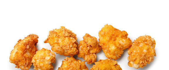 Crunchy fried popcorn chicken on white background