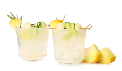 Glasses of melon cocktail on white background