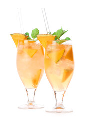 Glasses of melon cocktail on white background