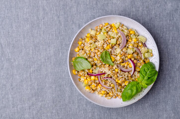 Lentil salad with wheat and vegetables