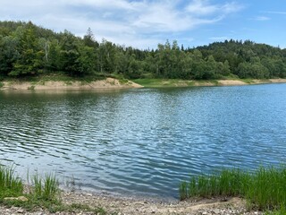 Artificial reservoir Lake Lokve or Artificial accumulation Lokvarsko Lake - Gorski kotar, Croatia (Lokvarsko jezero ili umjetno akumulacijsko Omladinsko jezero, Lokve - Gorski kotar, Hrvatska)