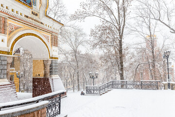 Vladivostok in winter. The Triumphal Arch of the Tsarevich in Vladivostok during a heavy snowfall.