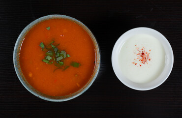 Lamb soup with rice, vegetables and cup of sour yogurt