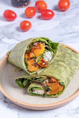 two piled veggie wraps