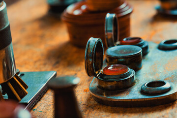 Vintage tools on display on an old watchmakers workbench