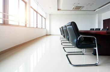 Conference table and chairs in modern meeting room