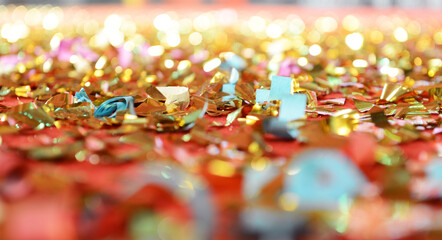 Colored confetti falling on floor