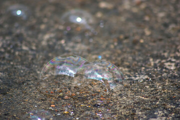 The bubble fell to the ground before pop