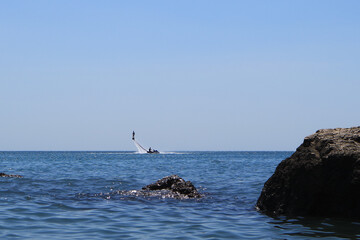 Flights over the sea on a water jet. Fliboarding.