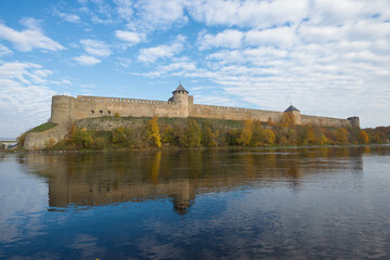 Naklejka na ściany i meble View of the old border Ivangorod fortress on a sunny October day. Leningrad region, Russia