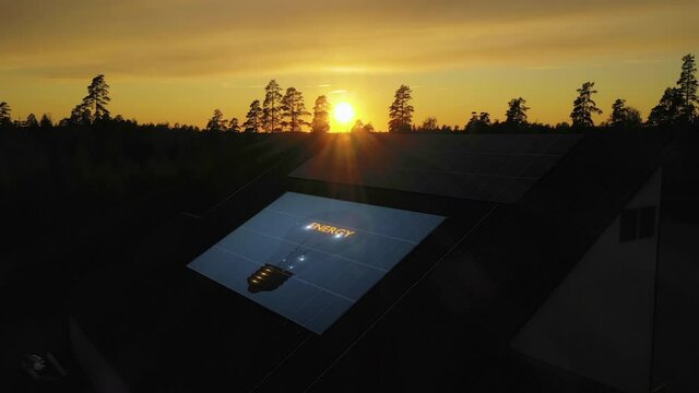 Light bulb on rooftop solar panels, Green energy heating a house - 3d animation