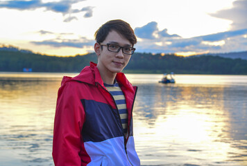 Young Asian man enjoying the beautiful sunset