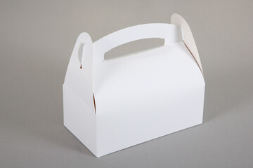 White mockup small blank paper pastry candy box with handle in grey background