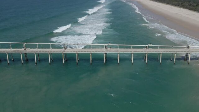 Tweed Sand Bypassing, TSB - Transport System That Collects Sand From Tweed River Entrance At Letitia Spit In Fingal Head NSW, Australia. - aerial