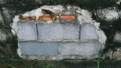 The new plastered wall had a mistake.