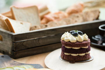 Blueberry cheesecake on wooden table, birthday party, corporate event or wedding celebration