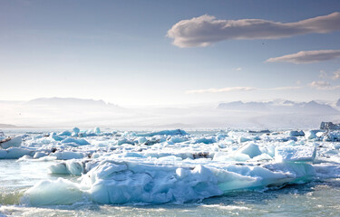 Fototapeta na wymiar Icebergs float on Jokulsarlon glacier lagoon - Iceland
