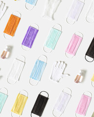 Protective colorful face masks Pattern with medical surgical masks, hand sanitizer gel and rubber gloves