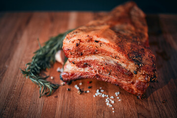 Barbecue ham, bacon, pepper, garlic. Homemade natural food. Still life with barbecue. Focus on the foreground.