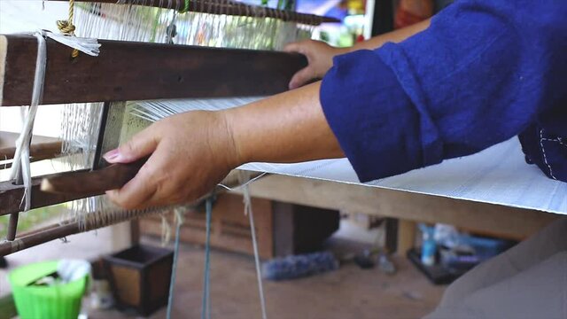 Traditional Handmade Cotton Weaving Free Standing Loom with longitudinal threads the warp, and the lateral threads are the weft, woof, or filling