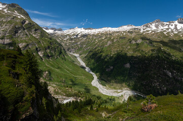Fototapeta premium River and glacier in the Austrian Alps (near Grossvenediger) in summer
