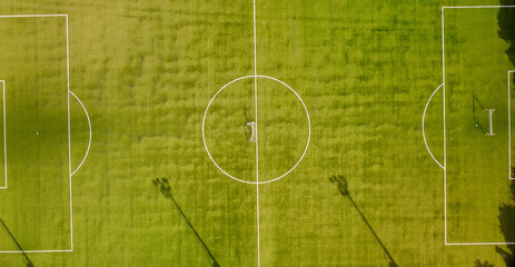 Soccer field as seen from a flying drone. High viewpoint.