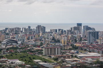  ariel panoramic view of old city and skyscrapers with the sea from the mountains