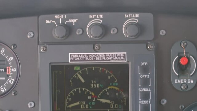 different control boxes inside a helicopter where we see all the markers with all the controllers and all kinds of very technical measuring device to know how the helicopter flies