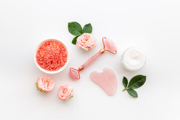 Cosmetics products with gua sha face massage stone and roller