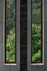 Vertical window overlooking a forest
