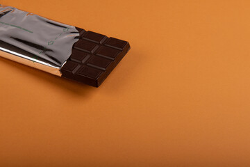 Chocolate on orange background
