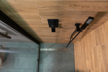 View from the top of the cubicle looking down into a shower