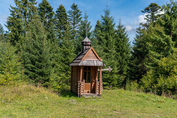 An old little wooden house outdoors in the forest