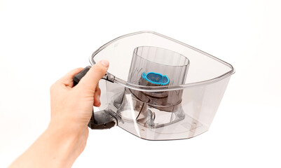 Cleaning filter Vacuum cleaner on a white background clean house cleaning garbage can