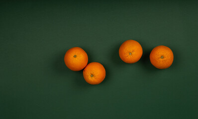 Orange on elegant dark green background