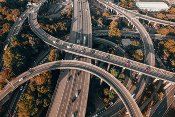 Vehicles Driving on a Spaghetti Interchange at Sunset