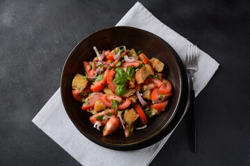 Panzanella, traditional Italian salad with tomatoes and bread. Tuscan , Mediterranean healthy food.