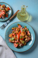 Panzanella, traditional Italian salad with tomatoes and bread. Tuscan , Mediterranean healthy food.