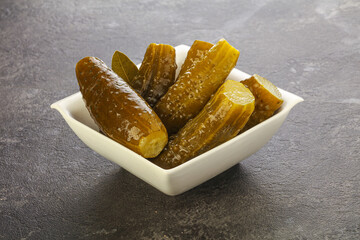 Marinated pickled cucumbers in the bowl