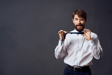 manager holding a tie executive office isolated background