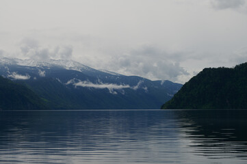 Beautiful panoramic view at Kucherla mountain lake and mountain range. Belukha national park, Altai...