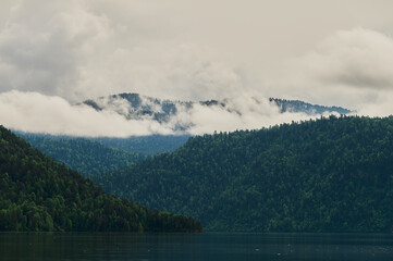 Beautiful panoramic view at Kucherla mountain lake and mountain range. Belukha national park, Altai...