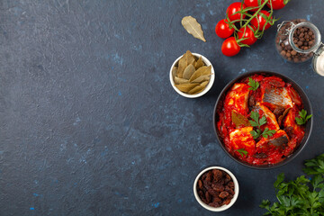 Herring fillet salad in tomato sauce.