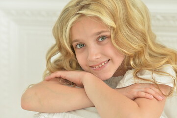 beautiful smiling girl posing in studio