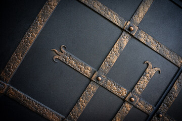 Decorating wrought iron gates with metal strips