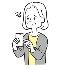 スマホ操作中がっかりした高齢女性