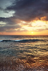 Scenic golden sunset over the sea.