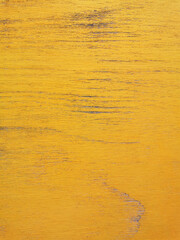texture of old wood plank with peeling yellow paint